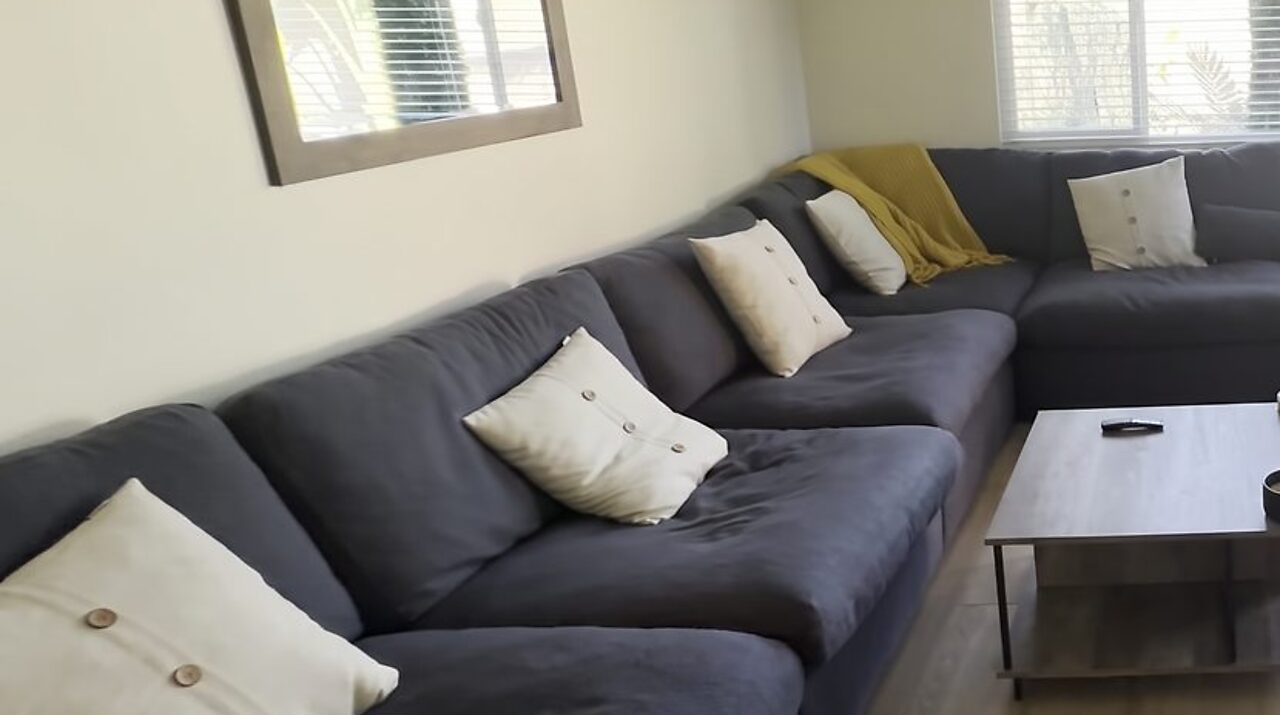 Furnished living room at Her Aria women's recovery residence serving Los Angeles and San Bernardino Counties